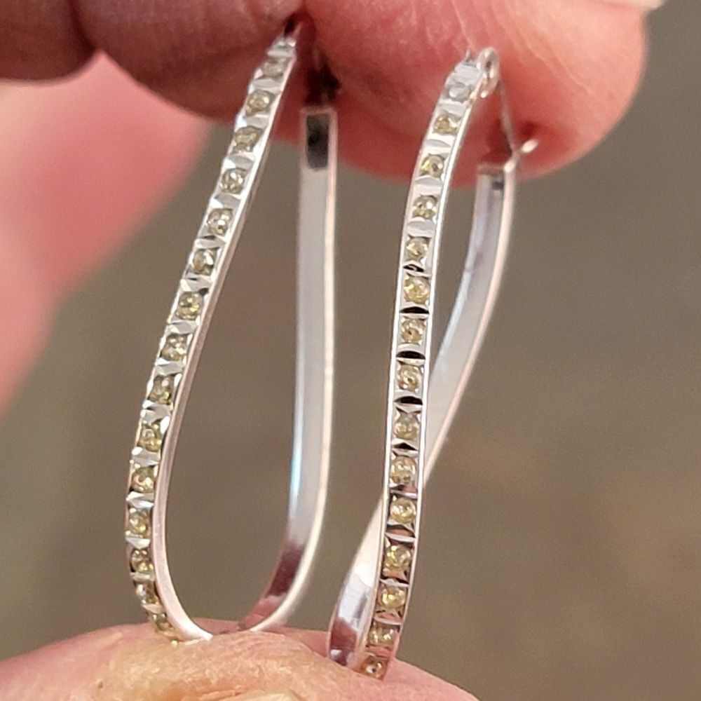 Wavy Twist SLC Sterling Silver Oval Hoop Earrings